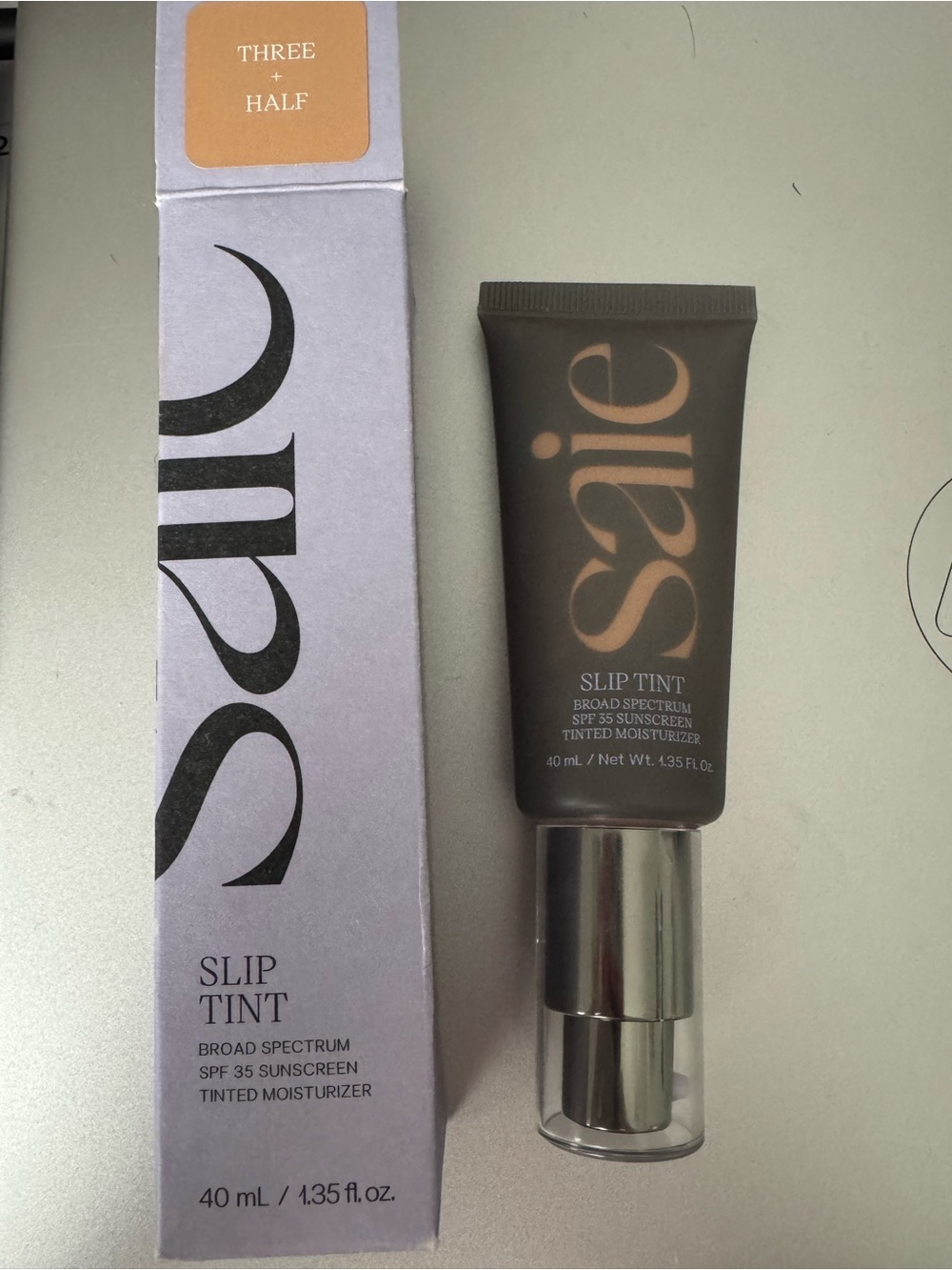 Saie Slip Tint Tinted Moisturizer — Three + Half Warm Beige